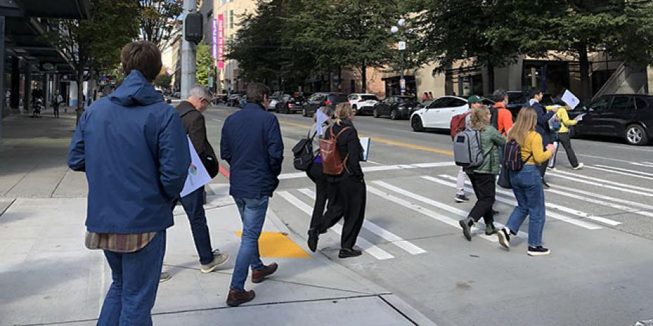 Pedestrians crossing street in downtown Seattle.